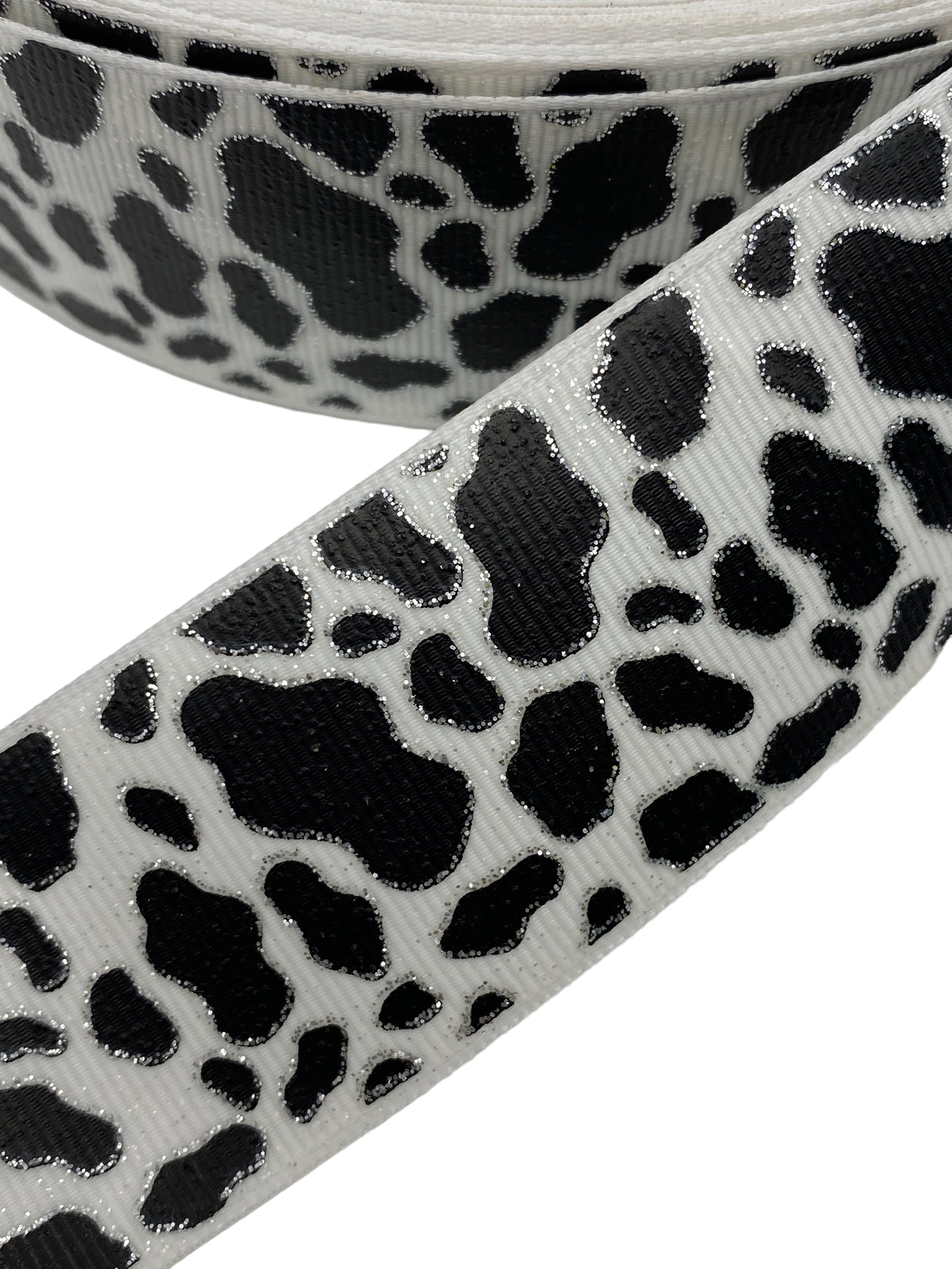 Cow Print Ribbon with sliver lining (38mm /1.5 inches) because of the glitter this is super stiff